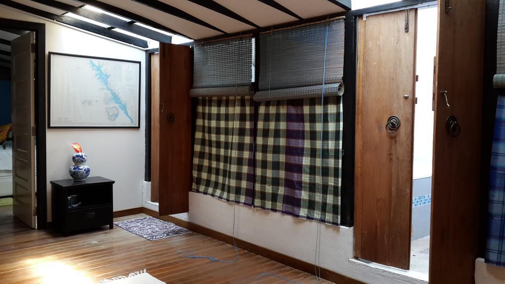 פנטאי קוק Experience Island Heritage Home חדר תמונה